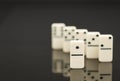 White dominoes showing leader or winner Royalty Free Stock Photo