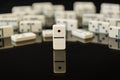 White dominoes showing leader or winner Royalty Free Stock Photo