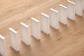 White dominoes standing