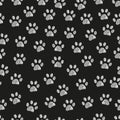 White doodle paw prints seamless fabric design pattern and background Royalty Free Stock Photo