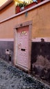 A white door in a doorway made of natural stone. Lisbon, Portugal