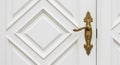 White Door with Golden Handle and Lock Royalty Free Stock Photo