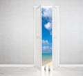 White Door open to the perfect beach Royalty Free Stock Photo