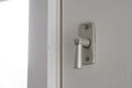 White door with security lock doorhandle Royalty Free Stock Photo