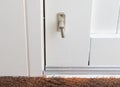 White door with security lock doorhandle Royalty Free Stock Photo