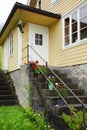 White door and stairs of Norway house Royalty Free Stock Photo