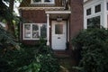 White door and surrounding architecture, Holland. Royalty Free Stock Photo