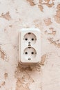 White double power socket on plaster wall in modern room interior Royalty Free Stock Photo