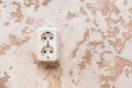 White double power socket on plaster wall in modern room interior Royalty Free Stock Photo