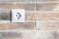 white double socket is built into the brick wall Royalty Free Stock Photo