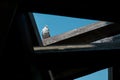 White dove against the blue sky. Triangular frame, summer sunny day