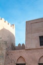 A white dove sitting on the fortification of the Fujairah Fort United Arab Emirates