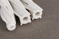 white dowel for foam concrete on a gray background Royalty Free Stock Photo