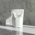 White Doypack Packaging Mockup on Marble Background Royalty Free Stock Photo