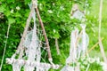 White dream catcher in a triangle shape close up Royalty Free Stock Photo