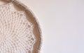 White dreamcatcher hanging on a white wall. Boho interior decor Royalty Free Stock Photo