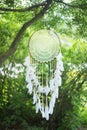 White decorative dreamcatcher, spiritual amulet, protection. Boho style