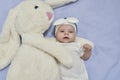 Newborn baby girl with her bunny Royalty Free Stock Photo