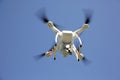 White drone with clear blue sky