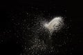 White dust debris isolated on black background Royalty Free Stock Photo