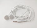 White earphone on the white background.