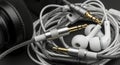 White Earphones with Coiled Cable and Jacks Royalty Free Stock Photo
