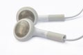 White earphones isolated on white background with clipping path Royalty Free Stock Photo