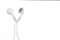 White earphones isolated on white background with clipping path, copy space Royalty Free Stock Photo