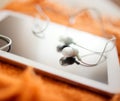 White earphones and tablet pc