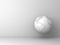 White earth globe isolated on white wall background with shadow