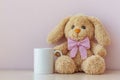 A white Easter coffee mug mockup and a stuffed bunny with a pink bow, positioned on a lilac-hued background Royalty Free Stock Photo