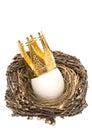 White easter egg with golden crown decoration