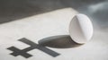 easter egg with cross shade on the grey light background Royalty Free Stock Photo