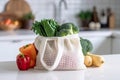 White eco friendly shopping bag with fresh vegetables. Sustainable mesh tote shopper bag, fresh vegetables on wooden Royalty Free Stock Photo