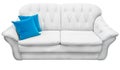 White eco leather sofa with blue pillow. Soft snow white couch with coach-type screed capitone. Classic divan on Royalty Free Stock Photo