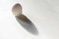 White egg on a white isolated background with shadow. Ingredient.Healthy food.Easter Royalty Free Stock Photo