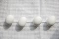 White eggs on a linen cloth
