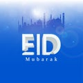 White Eid Mubarak Font With Silhouette Mosque, Crescent Moon On Blue Bokeh Royalty Free Stock Photo