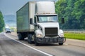 White Eighteen-Wheeler Semi On Interstate Highway