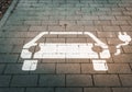 White electric car sign on the ground Royalty Free Stock Photo