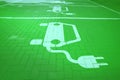 white electric car symbol on pavement of a parking lot for battery electric vehicles Royalty Free Stock Photo