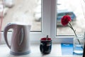 White electric kettle on the windowsill, Royalty Free Stock Photo