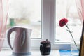 White electric kettle on the windowsill, Royalty Free Stock Photo