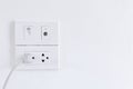 White electric plugs on wall background,White outlet interior, interior electric outlet in home,Socket electricity interior. Royalty Free Stock Photo