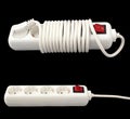 White electric splitter isolated over dark background