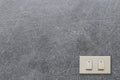 White electric switch on stone wall and have copy space to input Royalty Free Stock Photo
