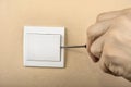 White electric switch with on a wall and without cover Royalty Free Stock Photo
