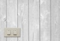 White electric switch on wooden wall. Royalty Free Stock Photo