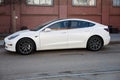 white electric Tesla Model 3 dual motor