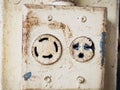 White electrical plug in the electric socket on a wall Royalty Free Stock Photo